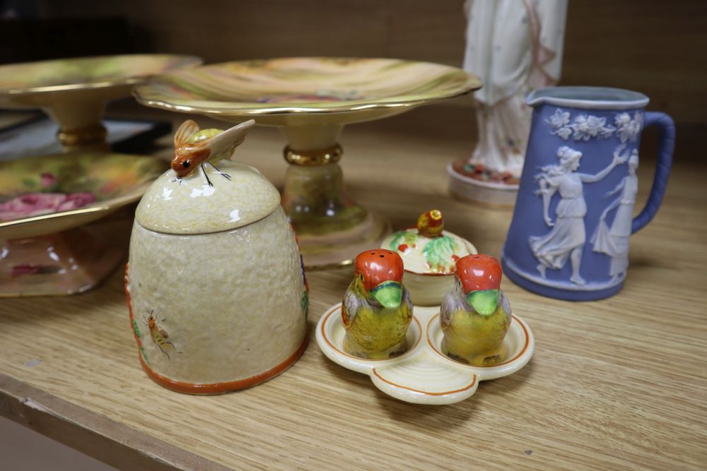 A Victorian John Bevington earthenware female figure, a Japanese cruet and a honey pot in Clarice Cliff style, and four other items